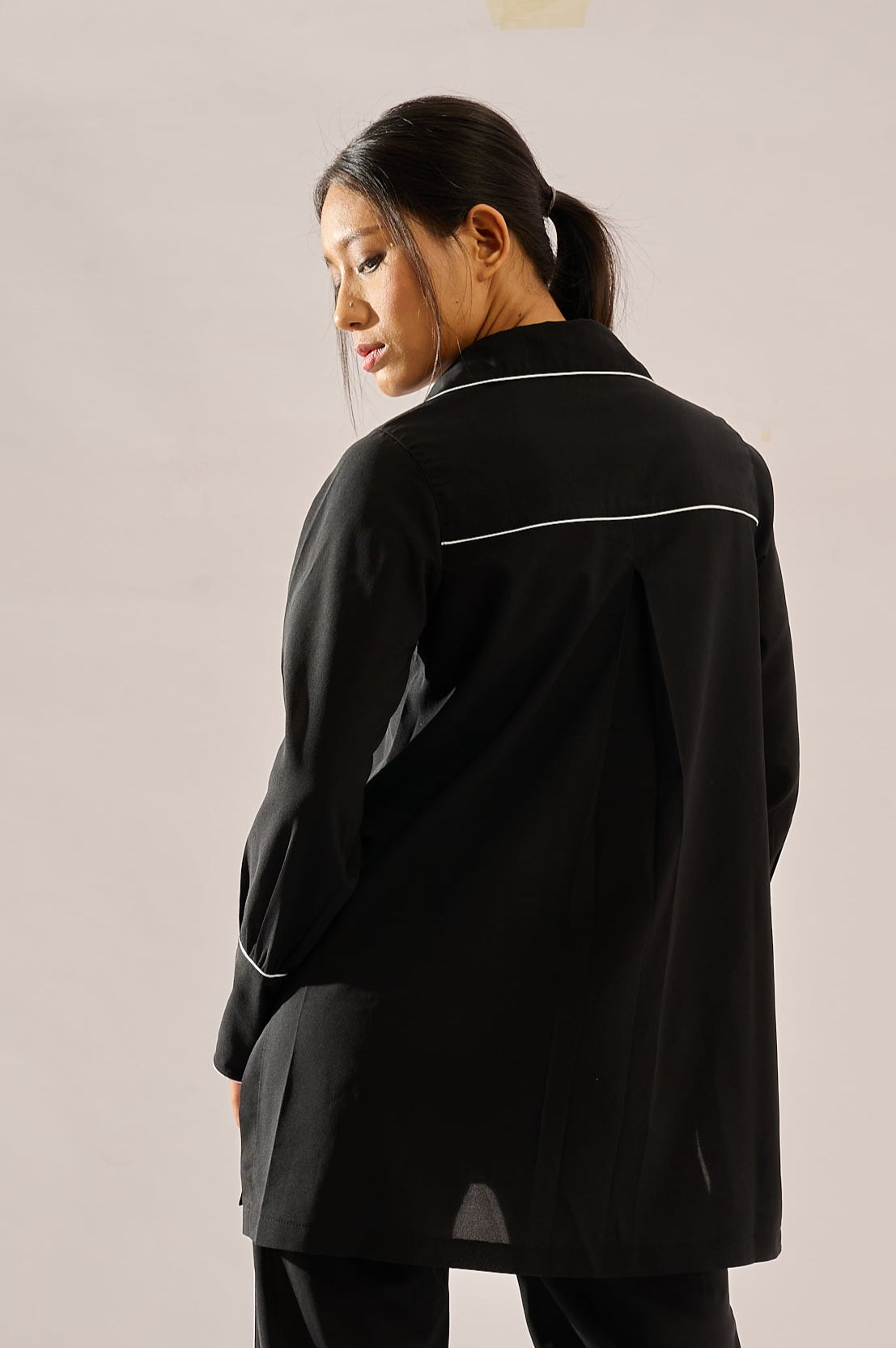 Monochrome formal top in black — back view | Haus of Handmade